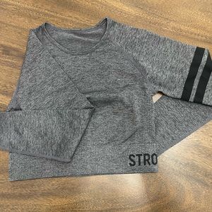 Stronger (designed in Sweden) Crop top with a long sleeve.